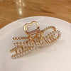 Half bow pearl hair clip