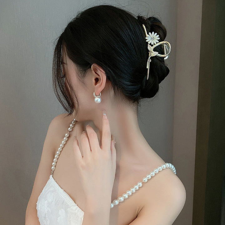 Haarspange mit kleinen Perlen und Blumen 