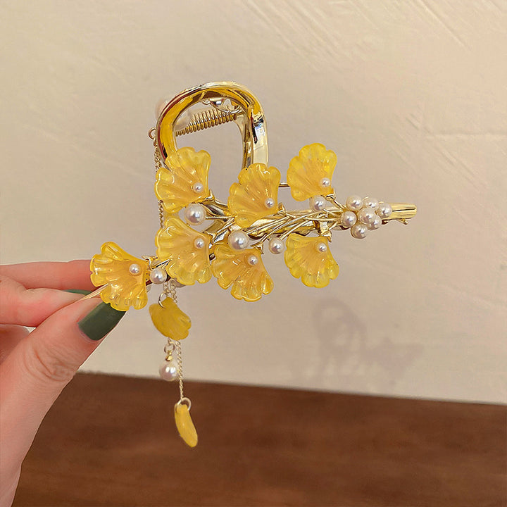 Pince à cheveux à pompon en feuille de ginkgo 